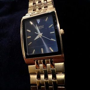 Bulova Caravelle mens gold watch ***Tells perfect time. Battery not included